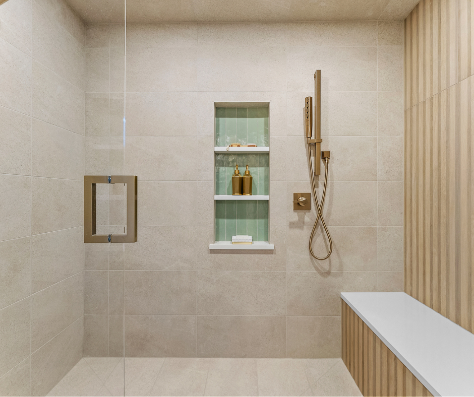 Modern walk-in shower with timeless beige tile, bench and niche shelves